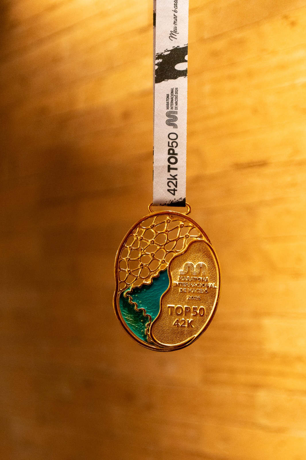 Medalha Top 50 · 42K — Maratona Internacional de Maceió 2026